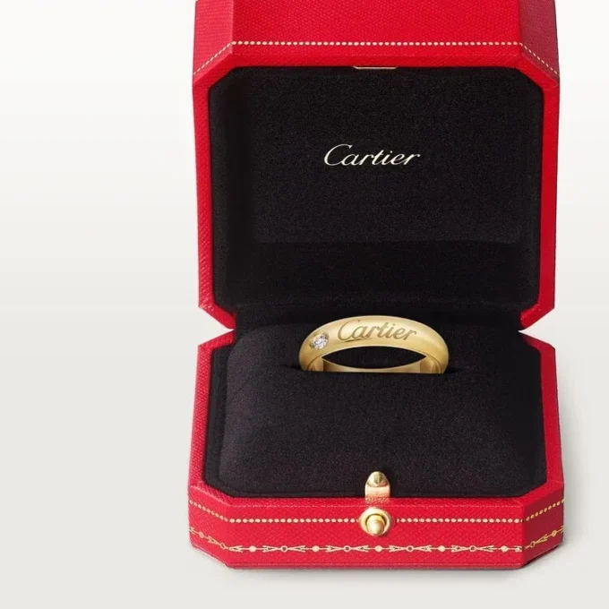 C De Cartier trouwring, 4 mm breed, 1 diamant