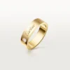 C De Cartier trouwring, 5 mm breed, 1 diamant