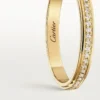 Cartier D’amour trouwring, 2,3 mm breed, bezet