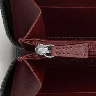 Internationale portemonnee met rits, Must de Cartier – Zwart kalfsleer, palladiumafwerking – Cartier
