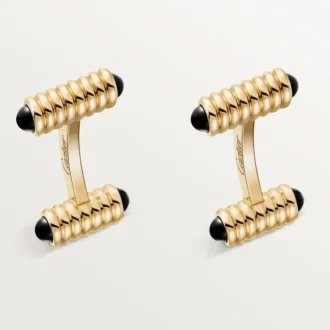 Manchetknopen met veermotief