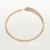 Panthere De Cartier-armband, klein model, half bezet