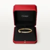 Panthere De Cartier-armband, klein model, half bezet