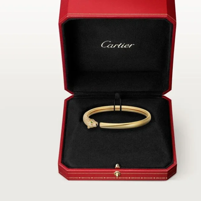 Panthere De Cartier-armband, klein model, half bezet