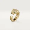 Panthere De Cartier-ring – geelgoud, diamanten, smaragden, onyx – Cartier