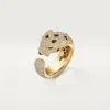 Panthere De Cartier-ring – geelgoud, smaragden, onyx, diamanten – Cartier