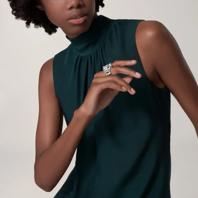 Panthere De Cartier-ring – Witgoud, onyx, smaragden, diamanten – Cartier