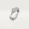 Panthere De Cartier-ring – Witgoud, smaragden, onyx, diamanten – Cartier