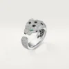 Panthere De Cartier-ring – Witgoud, smaragden, onyx, diamanten – Cartier