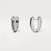 Panthere Diamond kleine hoepeloorbellen, witgoud | Cartier Us