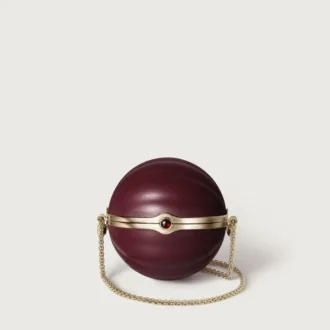 Ronde tas met gadroonmotief, Cartier Soir