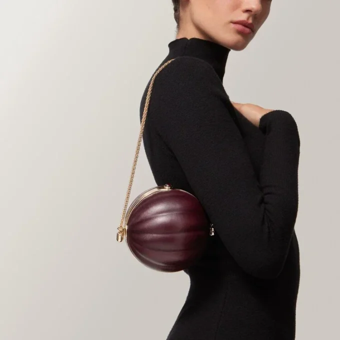 Ronde tas met gadroonmotief, Cartier Soir