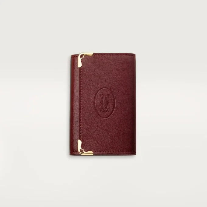 Sleutelhanger met 6 sleutels, Must de Cartier – Bordeauxrood kalfsleer, gouden afwerking – Cartier