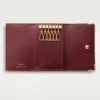 Sleutelhanger met 6 sleutels, Must de Cartier – Bordeauxrood kalfsleer, gouden afwerking – Cartier