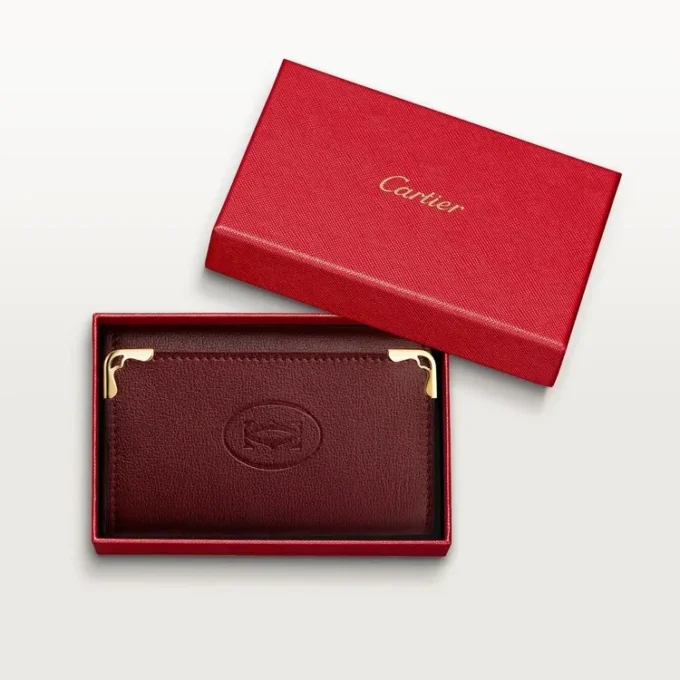Sleutelhanger met 6 sleutels, Must de Cartier – Bordeauxrood kalfsleer, gouden afwerking – Cartier