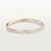 Trinity-armband, klein model, half bezet