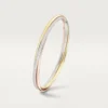 Trinity-armband, klein model, half bezet