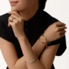 Trinity-armband, klein model, half bezet