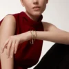 Trinity-armband, klein model, half bezet