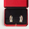 Trinity-hoepeloorbellen in driekleurig goud | Cartier Us