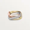 Trinity-ring, kussenvormig, middelgroot model, half bezet