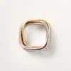 Trinity-ring, kussenvormig, middelgroot model, half bezet
